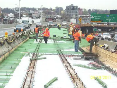 A group of people working on the tracks.